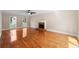 Bright living room with hardwood floors and fireplace at 2907 Wickford Nw Dr, Kennesaw, GA 30152