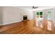 Spacious living room with hardwood floors and fireplace at 2907 Wickford Nw Dr, Kennesaw, GA 30152