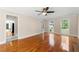 Open living room with hardwood floors and access to kitchen at 2907 Wickford Nw Dr, Kennesaw, GA 30152