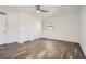 Bright bedroom with wood-look flooring, double closets, and a ceiling fan at 98 Ardmore Nw Pl # 3, Atlanta, GA 30309