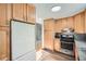 Updated kitchen with ample cabinetry, stainless steel appliances, and modern flooring at 98 Ardmore Nw Pl # 3, Atlanta, GA 30309