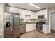 Updated kitchen, featuring stainless steel appliances and granite countertops at 6602 Crossing Creek Pt, Austell, GA 30168