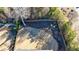 Aerial view of backyard, showing privacy fence, garden space at 611 Taymack W, Woodstock, GA 30188