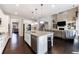 Open concept kitchen with island and stainless steel appliances at 611 Taymack W, Woodstock, GA 30188