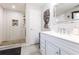 Beautiful bathroom featuring a walk-in shower with white subway tile and a modern vanity at 2575 Baker Nw Rd, Atlanta, GA 30318