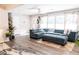 Spacious living area featuring a sectional sofa and hardwood floors at 2575 Baker Nw Rd, Atlanta, GA 30318