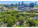 Aerial view showing a house and cityscape in the background at 311 Deering Nw Rd, Atlanta, GA 30309