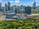 Aerial view of cityscape with buildings and green spaces at 311 Deering Nw Rd, Atlanta, GA 30309