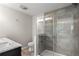 Bathroom with double vanity, large shower, and tile flooring at 311 Deering Nw Rd, Atlanta, GA 30309