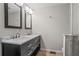 Bathroom with double vanity and marble countertop at 311 Deering Nw Rd, Atlanta, GA 30309