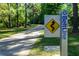 Sign marking the BeltLine trail, showing distance and elevation at 311 Deering Nw Rd, Atlanta, GA 30309