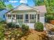 White charming ranch home with a covered porch at 311 Deering Nw Rd, Atlanta, GA 30309