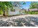 White house exterior with wooden steps and a spacious yard at 311 Deering Nw Rd, Atlanta, GA 30309