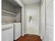 Convenient laundry area with washer, dryer, and shelving at 311 Deering Nw Rd, Atlanta, GA 30309