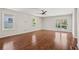 Spacious living room with hardwood floors and ceiling fan at 311 Deering Nw Rd, Atlanta, GA 30309