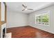 Spacious living room with hardwood floors and large window at 311 Deering Nw Rd, Atlanta, GA 30309