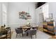 Bright dining room with hardwood floors and modern chandelier at 10444 Park Walk Pt, Alpharetta, GA 30022