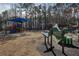 Harmony Park playground with play structures and musical instruments at 10444 Park Walk Pt, Alpharetta, GA 30022