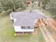 One-story home with a large yard and shed at 1202 Coan Dr, Locust Grove, GA 30248