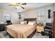 Spacious bedroom with carpet flooring, natural light, and a comfortable bed at 4288 Post Rd, Winston, GA 30187