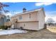 Tan house exterior with wooden deck and stairs at 459 Pleasant Way, Temple, GA 30179