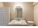 Updated bathroom features granite countertop, new vanity, and a large mirror at 2504 Stone Rd, Atlanta, GA 30344