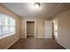 Spacious bedroom with large closet and neutral carpeting at 2504 Stone Rd, Atlanta, GA 30344