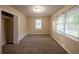Spacious bedroom with large windows and a walk-in closet at 2504 Stone Rd, Atlanta, GA 30344