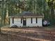 Cute cottage-style home with a covered porch at 2504 Stone Rd, Atlanta, GA 30344