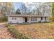 House exterior featuring a newly painted facade and landscaping at 2504 Stone Rd, Atlanta, GA 30344