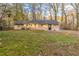 Back of the house showing a large yard and access at 2504 Stone Rd, Atlanta, GA 30344