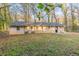Rear view of a ranch house with a spacious yard at 2504 Stone Rd, Atlanta, GA 30344
