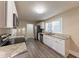 Updated kitchen featuring granite countertops and white cabinets at 2504 Stone Rd, Atlanta, GA 30344