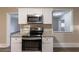 Updated kitchen with stainless steel appliances and white cabinets at 2504 Stone Rd, Atlanta, GA 30344