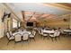 Spacious banquet hall featuring a stage and ample seating at 405 Laurel Spring Ct, Canton, GA 30114