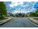 Community clubhouse with a circular driveway at 405 Laurel Spring Ct, Canton, GA 30114