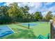 Tennis and pickleball courts with a green surface at 405 Laurel Spring Ct, Canton, GA 30114