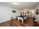 Finished basement with pool table and ample space for entertaining at 405 Laurel Spring Ct, Canton, GA 30114