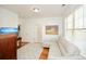 Light-filled home office with hardwood floors and comfortable seating at 405 Laurel Spring Ct, Canton, GA 30114