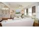 Spacious living room with comfy sofas, a large TV, and built-in shelving at 405 Laurel Spring Ct, Canton, GA 30114