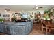 Open concept living and dining area with large sectional sofa at 405 Laurel Spring Ct, Canton, GA 30114