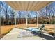 Covered patio with seating area at 405 Laurel Spring Ct, Canton, GA 30114