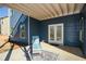 Ground level patio with seating and french doors at 405 Laurel Spring Ct, Canton, GA 30114