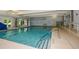 Inviting swimming pool with steps and handrail at 405 Laurel Spring Ct, Canton, GA 30114