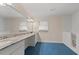 Bathroom featuring a large vanity with granite countertop and a walk-in tub at 4116 River Cliff Chase Se, Marietta, GA 30067
