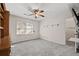 Bedroom with carpeting, a ceiling fan, and a view to the outside at 4116 River Cliff Chase Se, Marietta, GA 30067