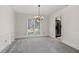 Traditional dining room with elegant chandelier and lots of natural light at 4116 River Cliff Chase Se, Marietta, GA 30067
