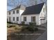 Two story house with a two car garage and gray shutters at 4116 River Cliff Chase Se, Marietta, GA 30067