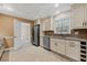 Well-lit kitchen boasts stainless appliances, granite countertops, and ample cabinet space for storage at 4116 River Cliff Chase Se, Marietta, GA 30067