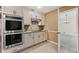 Beautiful updated kitchen with stainless steel appliances, granite countertops, and seamless access to the dining room at 4116 River Cliff Chase Se, Marietta, GA 30067